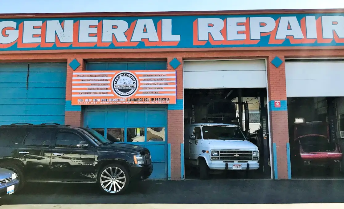 Photo of Mad Mecanix store front with installed signage